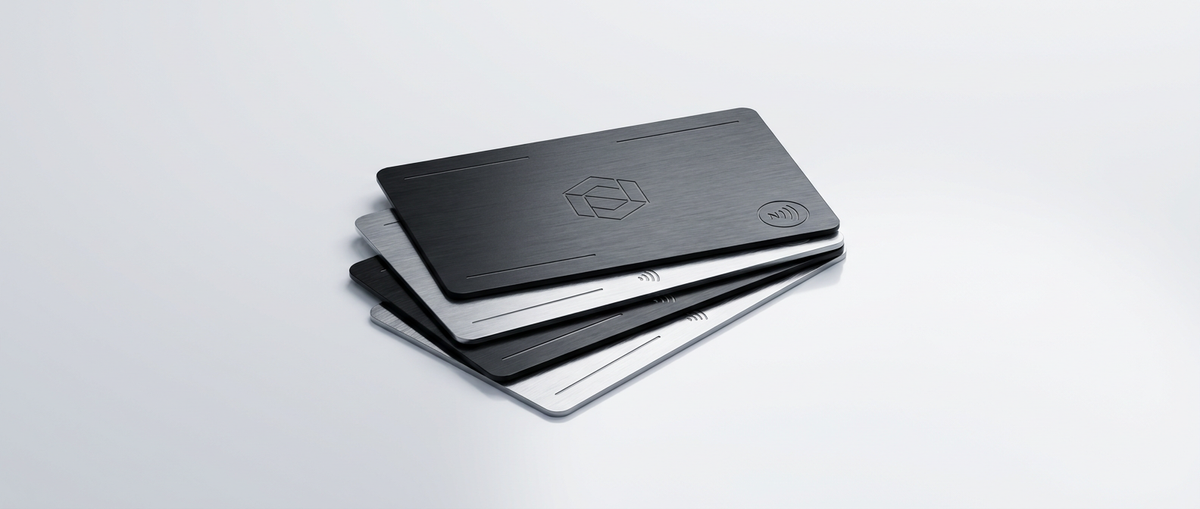Premium metal and NFC smart business cards on a clean studio background