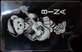 Bear with guitar on metal credit card — BINA