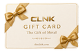 CLNK engraved metal gift card — The Gift of Metal, gold bows on cream