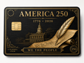 Ornate gold and black commemorative metal credit card with a quill pen, Constitution parchment reading We the People, and Independence Hall